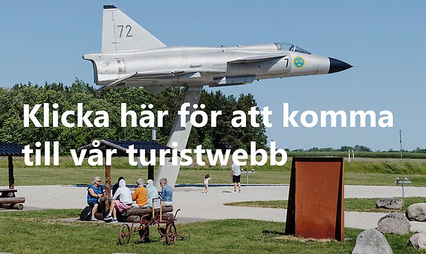 Foto från rastplats Viggen med texten "klicka här för att komma till vår turistwebb". 